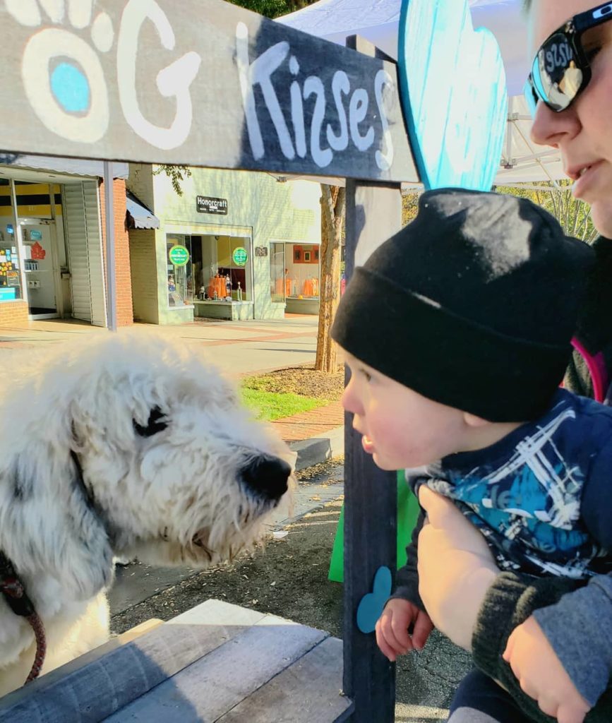 dog at kissing booth